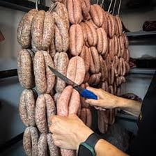 Several sausages joined together in a link