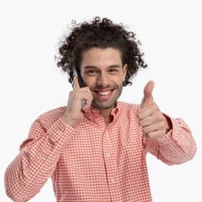 A person giving an approving thumbs-up.