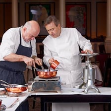 A diner tasting a carefully prepared meal.