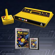 A classic Atari video game console with a joystick