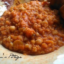 A bowl of thick lentil stew representing the biblical pottage.