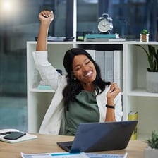 A professional working at a desk in an office
