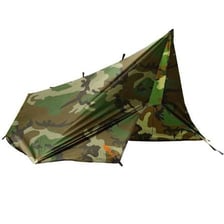 A tarp used as a shelter at a tropical campsite