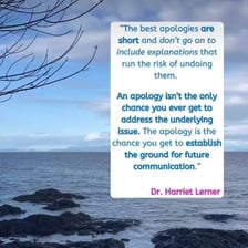 One person apologizing as another responds reassuringly.