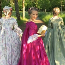 An aristocratic woman in period costume from the “Bridgerton” era.
