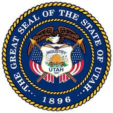 The Utah state seal displaying the motto “Industry.”