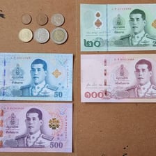 Thai baht banknotes and coins