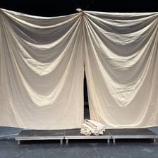 A theater stage prepared for the final act