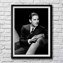 A classic Hollywood portrait of actor Errol Flynn.