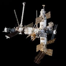 The Mir space station depicted orbiting Earth.