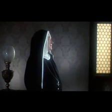 A still or stage scene associated with the song “Climb Ev’ry Mountain.”