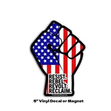 A person depicted in a defiant stance with a raised fist.