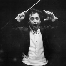 Zubin Mehta conducting an orchestra