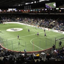 An indoor arena set up for a sporting event.