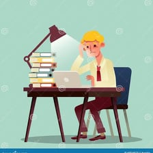 A person working intently at a desk.
