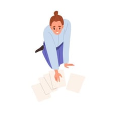 An illustration of a person awkwardly dropping objects.