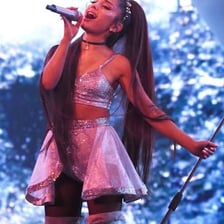 Singer Ariana Grande performing on stage.