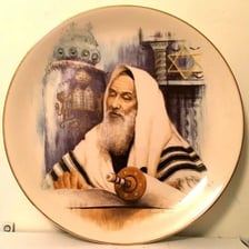 A rabbi studying or reading from a Torah scroll.