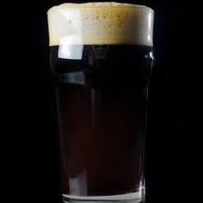 A pint of dark beer representing a Baltic porter.