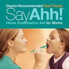 A doctor examining a patient's throat with a tongue depressor.