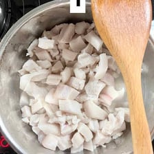 A bowl containing pale cooking lard.