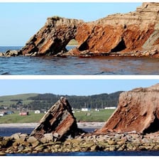 A coastal cliff showing the effects of erosion.