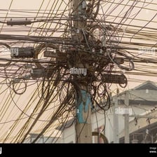 A severely tangled bundle of wires resembling a rat’s nest
