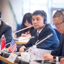 Business delegates meeting during an international trade mission.