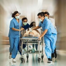 A nurse working in a hospital emergency setting