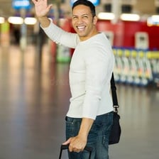 A person waving goodbye