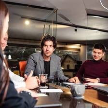 An agent meeting with a client in an office