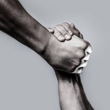 One person relying on another person’s helping hand