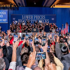 Crowd at a political rally associated with liberal views.