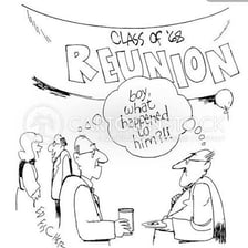 Former classmates greeting one another at a reunion