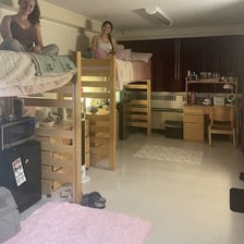 Students sharing a college dorm room.