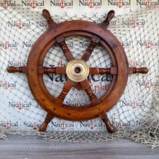 A traditional wooden ship’s wheel.