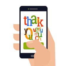 A smartphone displaying an appreciative text message.