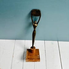 A Clio Awards statuette presented for advertising achievement.