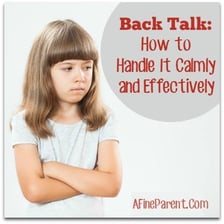 A child making a defiant expression while answering back