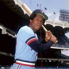 Rod Carew at bat in a baseball uniform.