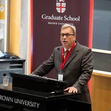 A college official speaking at a university.
