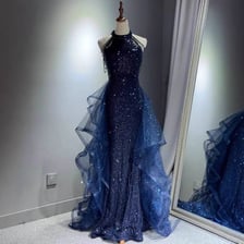 An elegant dress displayed on a mannequin