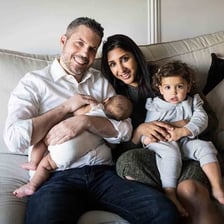Parents pictured with their children.