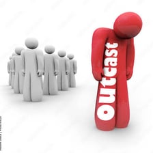 A person standing apart from a larger social group.