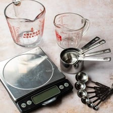 Measured portions of ingredients being divided into separate containers.