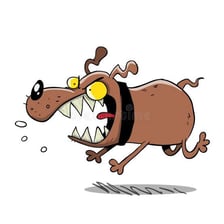 A small dog barking with its mouth open.