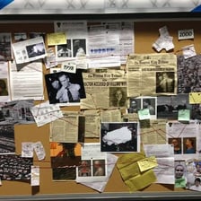 A police detective examining evidence during an investigation.