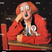 A vintage image of Coco the Clown in clown costume and makeup