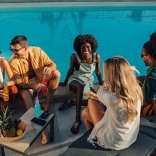 A group of friendly people chatting together at a social gathering