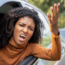 Person showing an irritated and frustrated expression